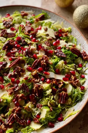 Shaved Brussels Sprout Salad with Pomegranate and Candied Pecans